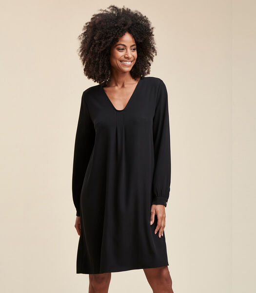 Korte zwarte jurk met lange mouwen