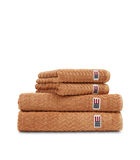 Handdoek in badstof van katoen/lyocell karamel image number 0
